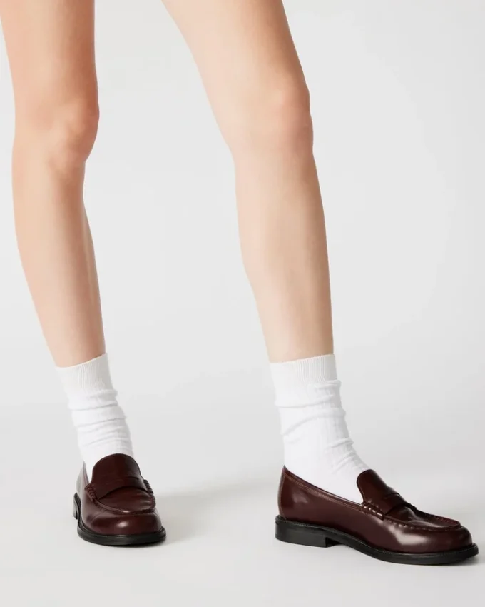 Madison en cuir noir et fausse fourrure