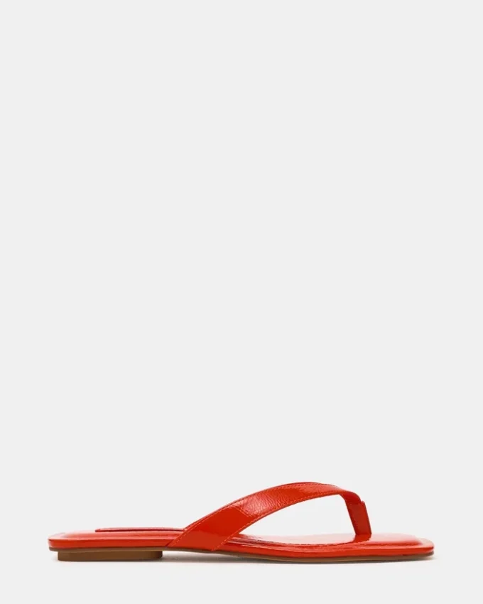 Trella en vernis rouge-orange Trella en vernis rouge-orange